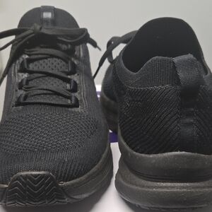 Skechers Women's Black Knit Slip-On Sneakers